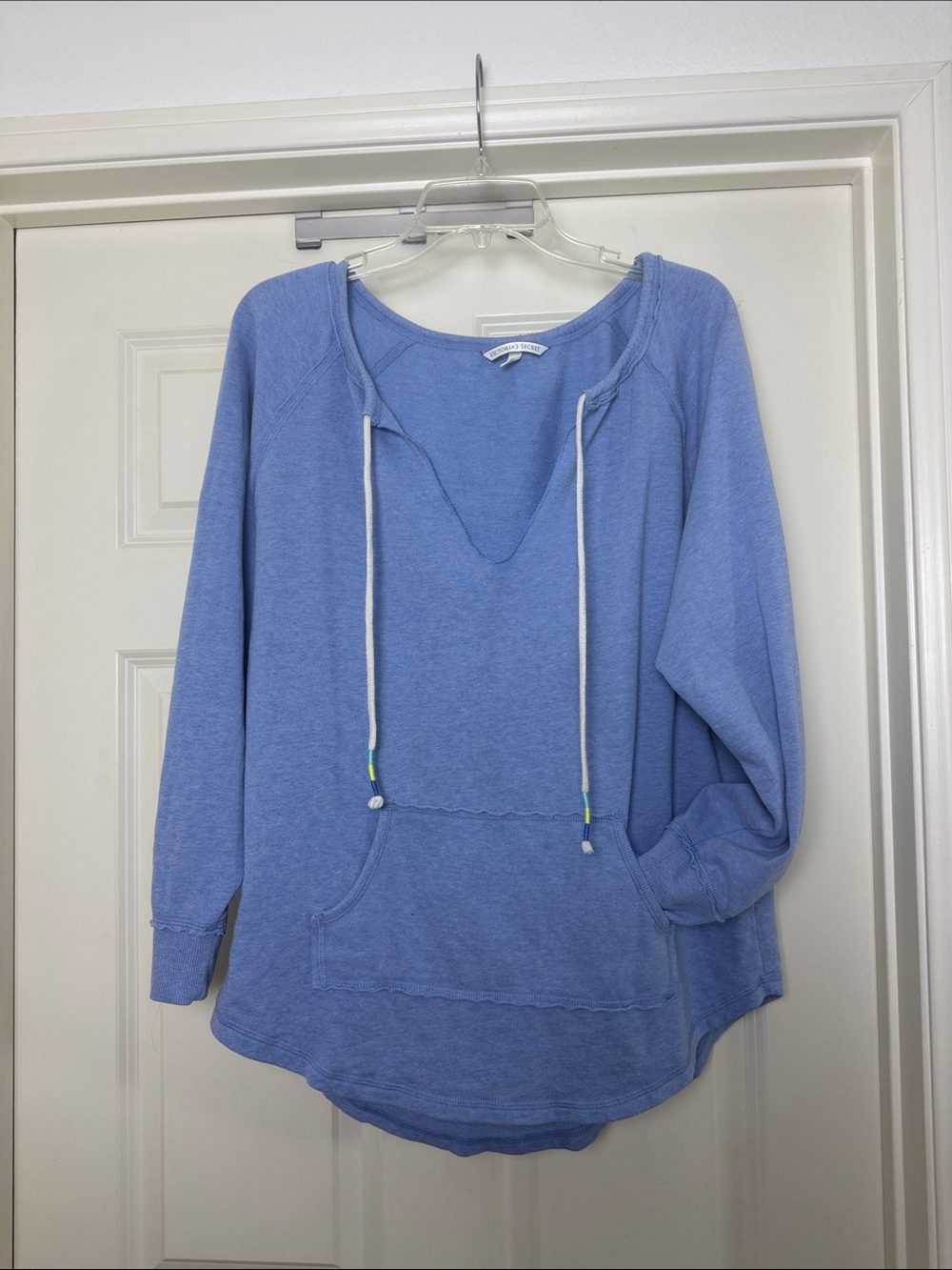 Victoria’s Secret Light Blue Raw Hem Pullover with Drawstring size M.